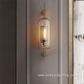 Long glass gold metal mesh wall light